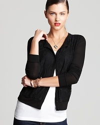 Delicate lace lends romantic inspiration to a Three Dots cardigan for effortless daytime drama.