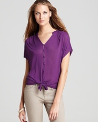 Showcase one of the season's richest colors with this Soft Joie top in a deep purple hue. Pair this relaxed top with a comfortable pair of jeans, or dress it up with sleek leather leggings.