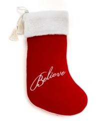 Show you believe. A plush white cuff, red boot and elegant rope and tassel trim make this quintessential Christmas stocking a festive addition to any holiday home.