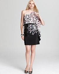 Trina Turk's free-spirited, one-shoulder dress boasts a floaty feather print and a flutter sleeve.