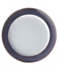 A true gem, these Amethyst wide-rimmed dinner plates are simply glazed, but boldly hued, in deep indigo and crisp white from Denby's collection of dinnerware. The dishes can embrace their luxe color alone or they can be paired with the playful dots of Amethyst Stone for a well-balanced and uniquely customized table setting.