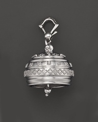 Inspired by Zen philosophy, this intricately detailed, polished finish sterling silver meditation bell from Paul Morelli jingles softly.