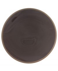 Rich chocolate hues and a dashing coupe shape give this collection from Calvin Klein undeniably chic style. The Tonal Edge dinnerware features lush brown glaze over fine porcelain with a matte bisque rim to create a duality of color.