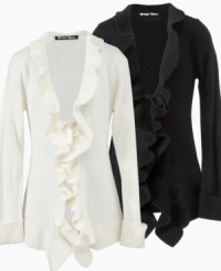 Rich ruffles. The sweet, flowy ruffles on this cardigan from Planet Gold is the perfect layering piece.