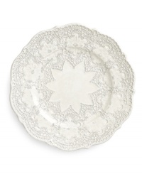 Handcrafted in the Italian tradition, the Merletto salad plate is intricately embellished with a lacy floral texture and painted a creamy antique white. An elegant companion to Arte Italica dinnerware.