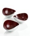 Full of surprises, these handcrafted nut bowls from Simply Designz feature sleek, polished aluminum lined with lustrous burgundy enamel. A bold set for serving snacks or simply decorating the table.