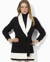 A soft cotton-blend cardigan is knit with a heritage-inspired shawl collar and finished with a flattering belted waist.