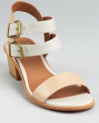 In neutral hues, these soft leather Lucky Brand sandals boast a feminine silhouette and trend-right block heel.