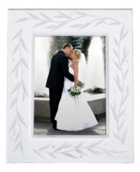 Put your most elegant photos on display with the Opal Innocence picture frame from Lenox. A delicate vine motif etched in crystal makes cherished memories shine. A beautiful wedding gift!