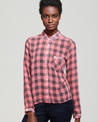 A great-looking button down with classic checks and a stylish asymmetric hem belongs in your closet.