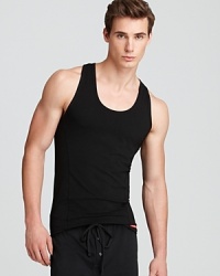 Because it grips the body for a smooth, streamlined look, this tank boasts masculine appeal to complement your build.