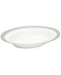 Sit down to a stylish table with the Hightown oval serving bowl by Martha Stewart Collection. Contemporary bone china dinnerware with a distinct platinum pattern puts modern sophistication at the top of your menu.