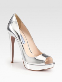 Metallic leather pump with a slender heel and sturdy platform. Self-covered heel, 5¼ (130mm)Platform, ¾ (20mm)Compares to a 4½ heel (115mm)Metallic leather upperLeather lining and solePadded insoleMade in Italy