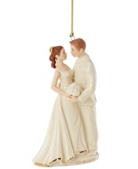 Make this Christmas a dual celebration with the Lenox Always and Forever bride and groom ornament. A beautiful couple decked in wedding whites and elegant gold accents make a most-appropriate gift for the happy couple.