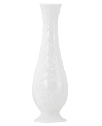 Featuring the embossed vine motif and shiny white glaze of the Opal Innocence Carved collection, this shapely bud vase is designed to refine your home indefinitely. A lovely bridal shower gift!