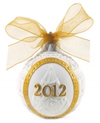 Make it the most elegant Christmas yet with this handmade porcelain ornament from Lladro. A beautiful bow, embossed candy canes and radiant gold accents make the 2012 tree one you'll always remember.