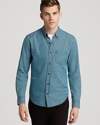 Toss on a casual cool denim button-down for a classic, easy-going look every time. From Vince.