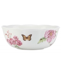 Grow your garden. The Butterfly Meadow Bloom serving bowl from Lenox features the sturdy, scalloped porcelain of original Butterfly Meadow dinnerware but with fresh pink and violet blossoms.