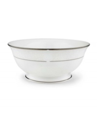 This classically designed serving bowl is accented by a platinum rim and a delicate flourish of vine-like, white-on-white imprints with raised, iridescent enamel dots. Measures 8-5/8 in diameter. From Lenox's dinnerware and dishes collection.