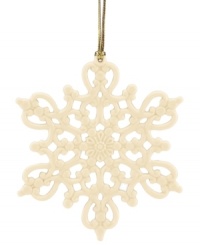 Turn a white Christmas fantasy into reality with this classic snowflake ornament from Lenox. Intricate pierced detail and an elegant ivory glaze help you and your family create your very own winter wonderland.