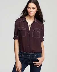 This berry-hued James Perse shirt borrows from classic western styling, featuring allover contrast stitched details and double front patch pockets.