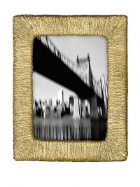 It's metal artistry with a New York edge- display your favorite memories in this hand-cast aluminum frame for a distinctive touch to any home display.HandmadeAluminum alloyImported