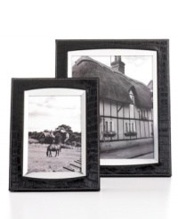 Show everyone your wild side. With silver trim and white stitching, the Faux Croc picture frame lends a touch of the exotic to your home gallery. From Leeber.