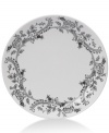 Oleg Cassini weaves a table of playful sophistication with the Ava dinner plate, featuring lacy flowers and dots in timeless black and white.