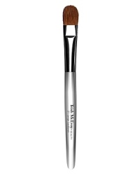 Trish's Brush 21 Large Laydown is designed for the placement and blending of concealers, creams, powders and liquids to the eyes and face. * Handcrafted for exquisite quality and durability * Precision-cut for technically perfect results * Brass ferrulesDirections: To place and blend color, use the flat side of the brush. Press for coverage, sweep for sheerness.To contour, define or precisely apply color, use the tip of the brush.Trish Tip: When using with powder, tap off excess and test the color on the back of your hand to ensure you have the desired amount of pigment.