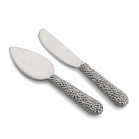 Marked by the incredible handcrafting that the Molten motif is known for, this cheese knife set features countless molten beads carefully placed by a highly skilled artisan. The look is streamlined, timeless, organic and soulful.