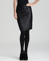 Lace, metallic shine and leather--three of this season's most sought-after trends--merge together seamlessly with this sophisticated DIANE von FURSTENBERG skirt that knows how to behave and when to party.