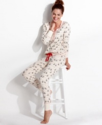 Lounge around in style. Kensie's Quite The Character pajamas feature a front placket up top and rib cuffs on the top and bottom.