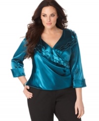 R&M Richards' plus size top makes a shimmering statement with its ruffle-tiered surplice neckline and cuffed sleeves. (Clearance)