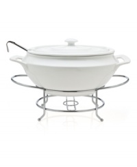 At once elegant and utilitarian, the Cucina soup tureen transitions flawlessly from oven to table and will keep your food piping hot, set in a silvertone metal rack. A must for the consummate host, from Godinger.