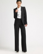 Smooth stretch wool pants with wide, straight legs.Wide waistband with hook-and-eye Belt loops Flat front with zip closure Inseam, about 35 96% virgin wool/4% elastane Dry clean Imported