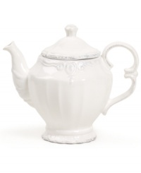 Embossed vines, graceful fluting and gently distressed accents give the Blanc teapot the classic, romantic feel of Versailles Maison's charming dinnerware collection.