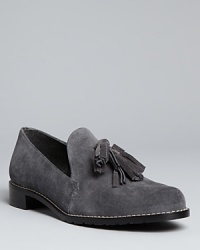 Stuart Weitzman nods to menswear with the Guido loafers, an oxford-inspired silhouette adorned with trend-right tassels.