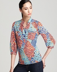 An artistic, multi-colored leopard print invigorates this elegant Trina Turk blouse with sheer animal magnetism--it's no wonder why it's fall's most trend-worthy look.