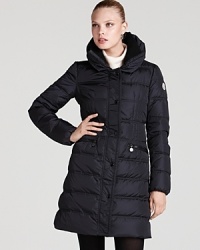 Winter weather is no match for this cozy down coat by Moncler. A high funnel collar with a soft knit lining lend extra protection as temperatures drop.