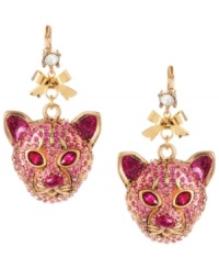 Jungle cat chic. Glitzy tiger charms and a dainty bow adorn these charming drop earrings from Betsey Johnson. Embellished with pink-colored crystals, they're crafted in antique gold tone mixed metal. Crystal accents at post. Approximate drop: 2-1/4 inches.