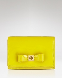 Petite in size, this Tory Burch card case comes dressed up in a bow and finished in pretty patent leather.