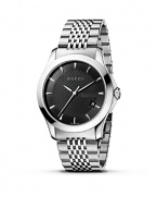 A stainless steel watch from the Gucci G-Timeless collection. Round black dial with pattern and stick hour indices. Sweep second hand and date window.