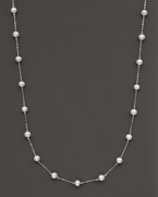 Beaded 14 Kt. white gold necklace with fresh water pearl stations.