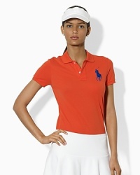 Ralph Lauren's official limited edition US Open polo shirt is rendered in breathable stretch mesh and mercerized for a subtle, chic luster.