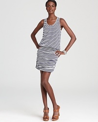 Style and comfort work their way into a KAS New York dress. A striped stretch knit with ruched sides will carry you comfortably through the day.