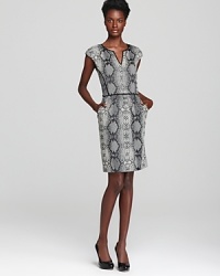 Take your work look up a notch with a snake-print Rebecca Taylor dress flaunting subtle front pleats and a back exposed zip with leather pull tab an edgy finishing touch.