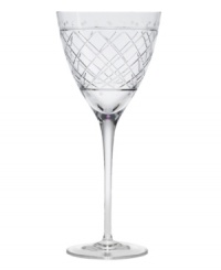 An intricate bias check pattern on this crystal wine glass adds sparkling sophistication to an elegant evening. (Clearance)