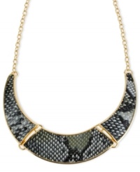 Unleash your inner wild child with this Haskell frontal necklace. Chic animal print adorns a half-moon silhouette. Crafted in gold tone mixed metal. Approximate length: 18 inches + 3-inch extender. Approximate drop: 1 inch.