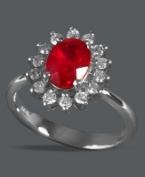 Regally stunning. This Royalty Inspired by Effy Collection ring shines with an oval-cut ruby center (1-1/2 ct. t.w.) surrounded by a sunburst of round-cut diamonds (1/2 ct. t.w). Set in 14k white gold.