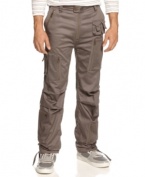 Detail oriented. Cargo pockets and zipper make these pants from Sean John great alternative to your denim.